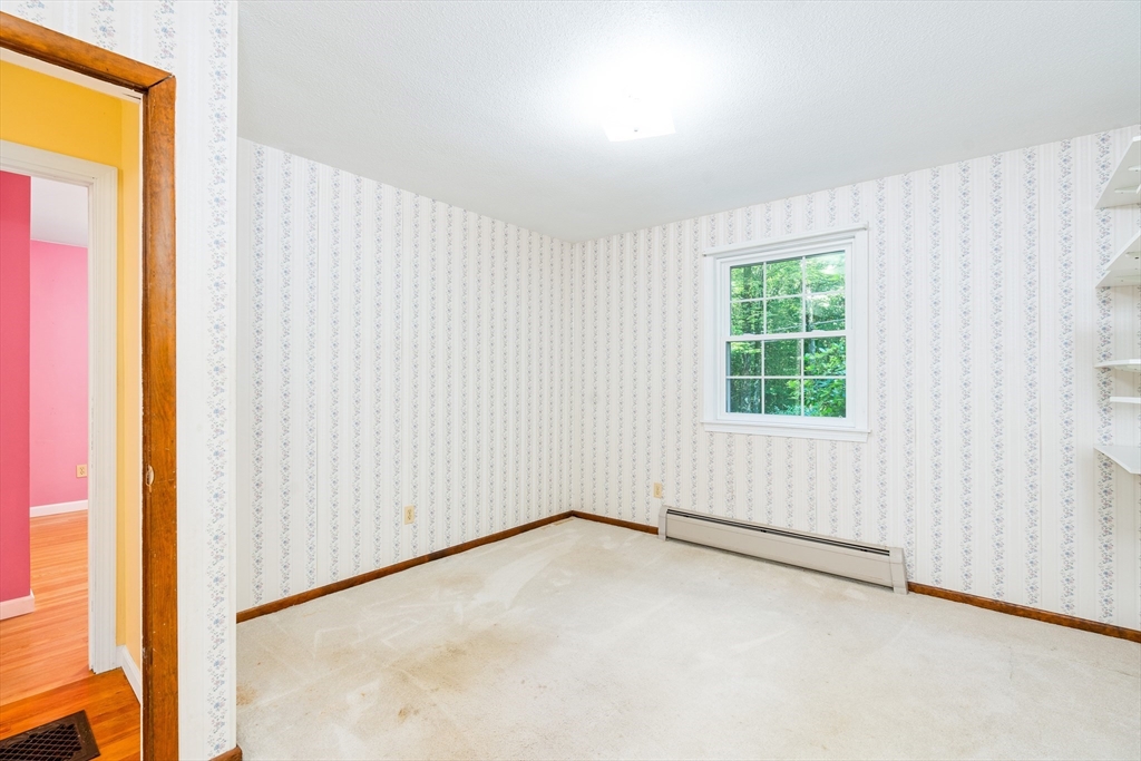 135 Blake Corner Road Phillipston, MA 01331 - Photo 23 of 42 an empty room with windows