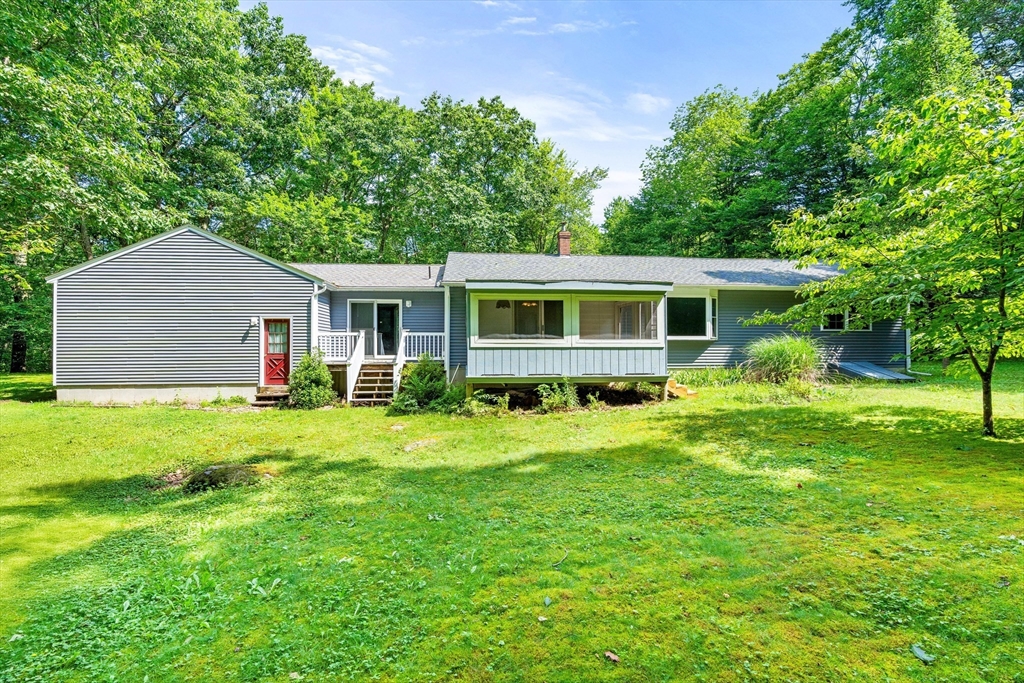 135 Blake Corner Road Phillipston, MA 01331 - Photo 34 of 42 a view of a house with a backyard