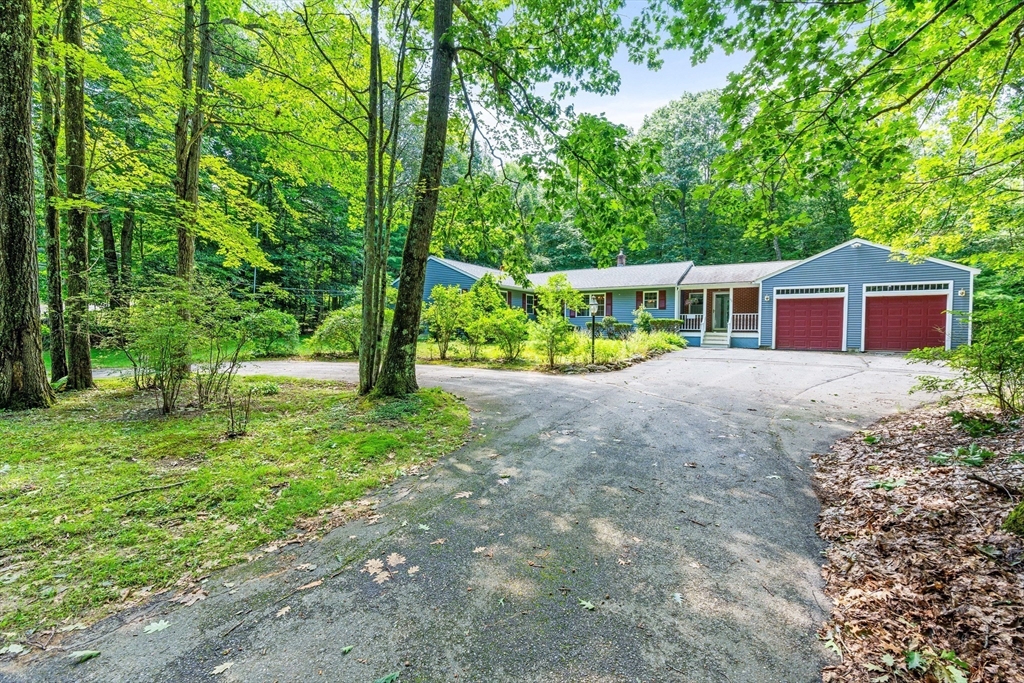 135 Blake Corner Road Phillipston, MA 01331 - Photo 38 of 42 a view of a house with garden and sitting area