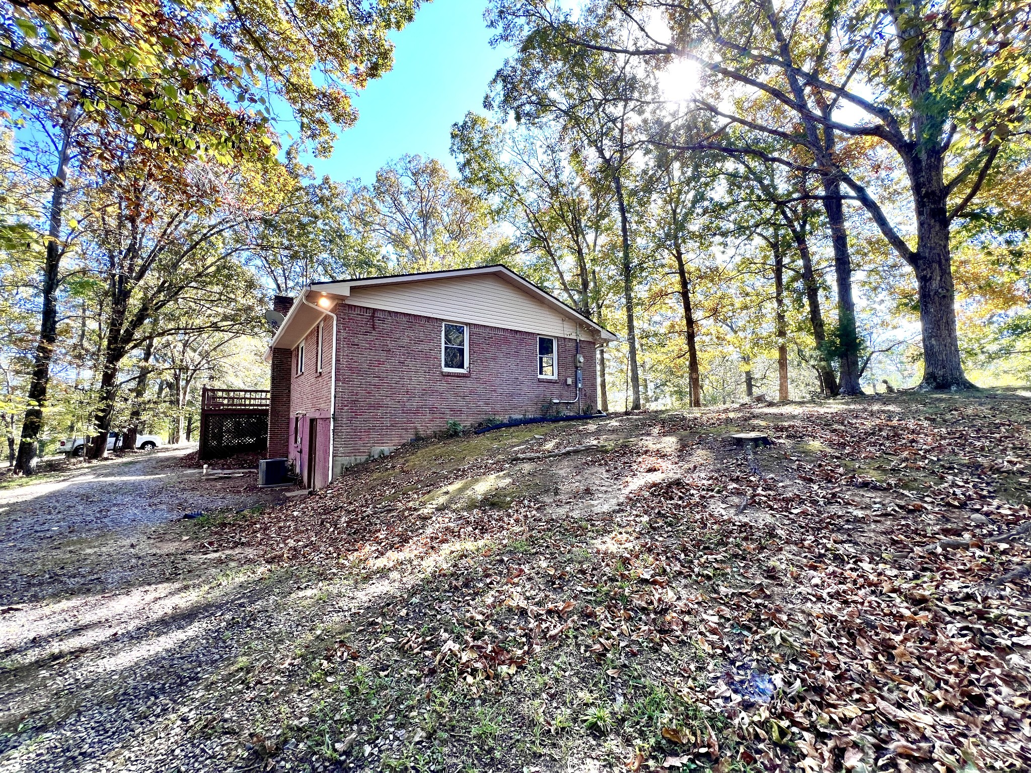 329 Valley View Road Dover, TN 37058 - Photo 13 of 35 a view of a house with a yard and large tree
