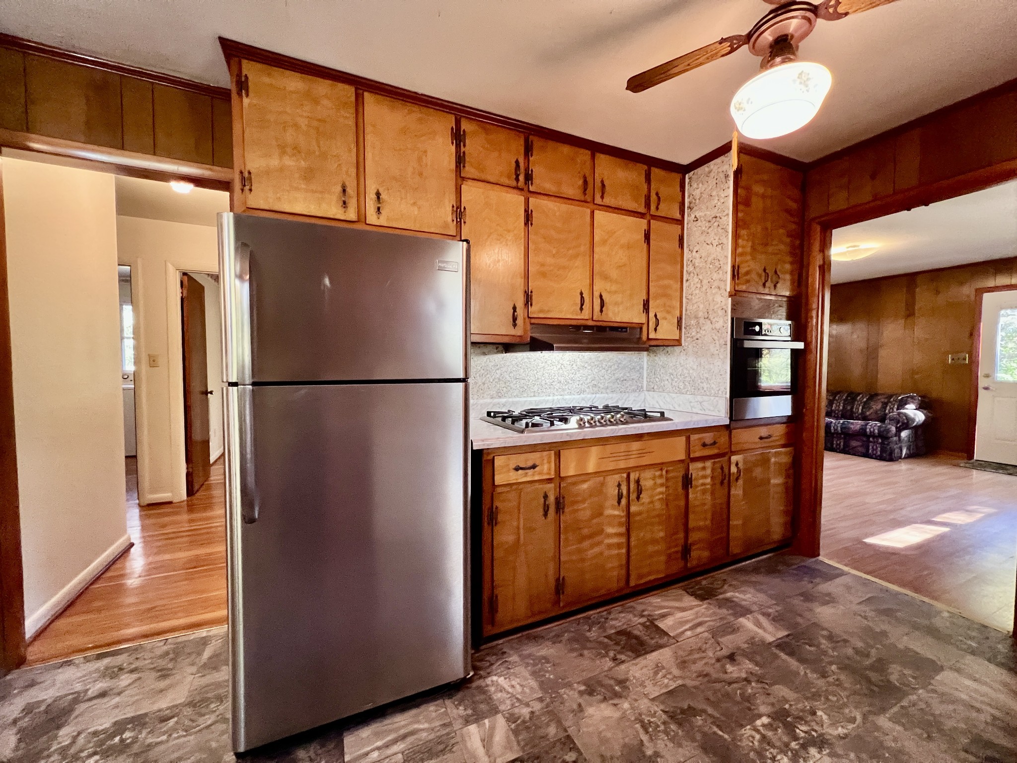 329 Valley View Road Dover, TN 37058 - Photo 19 of 35 a kitchen with stainless steel appliances granite countertop a refrigerator a oven a sink with a refrigerator and cabinets