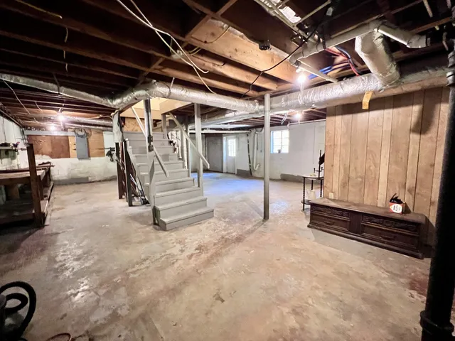 a view of a room with wooden walls