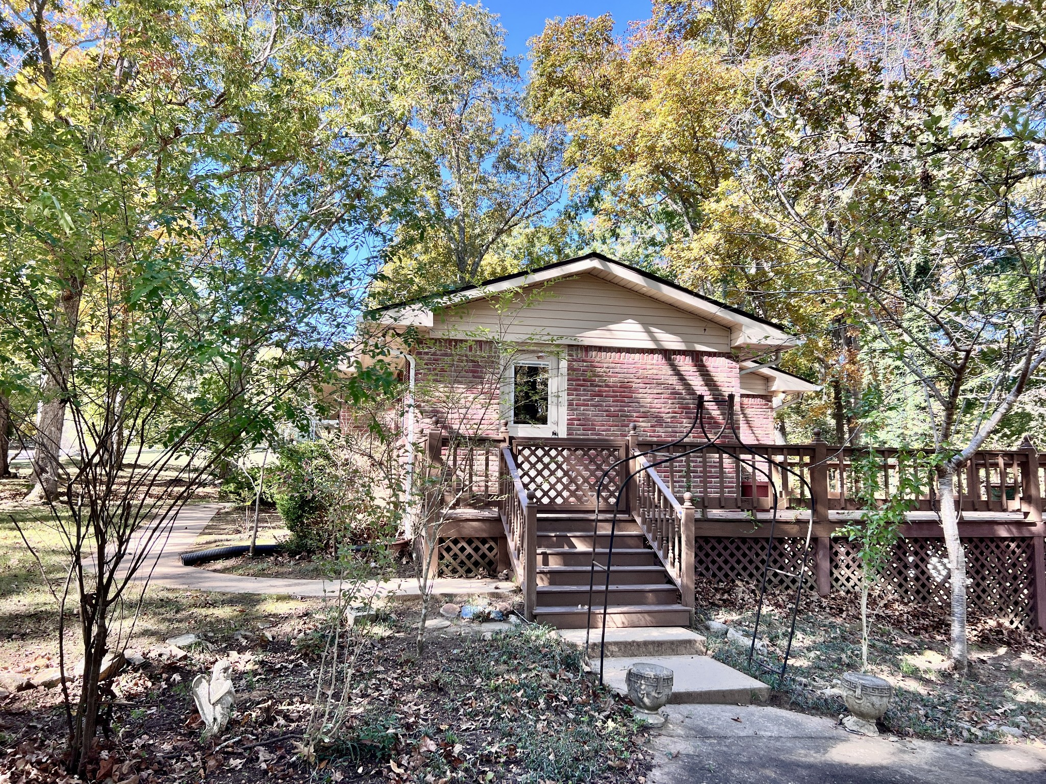 329 Valley View Road Dover, TN 37058 - Photo 4 of 35 a house with trees in the background