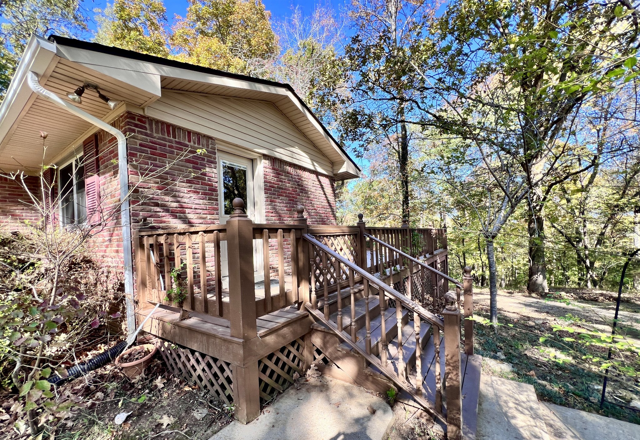 329 Valley View Road Dover, TN 37058 - Photo 5 of 35 a front view of a house with parking and windows