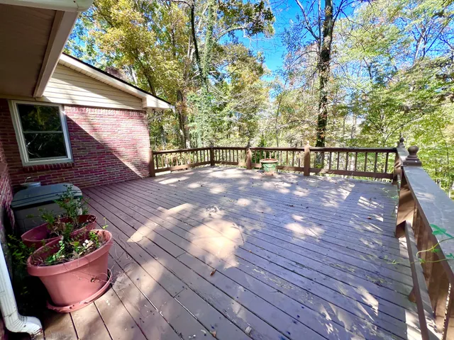 a view of a backyard with sitting area