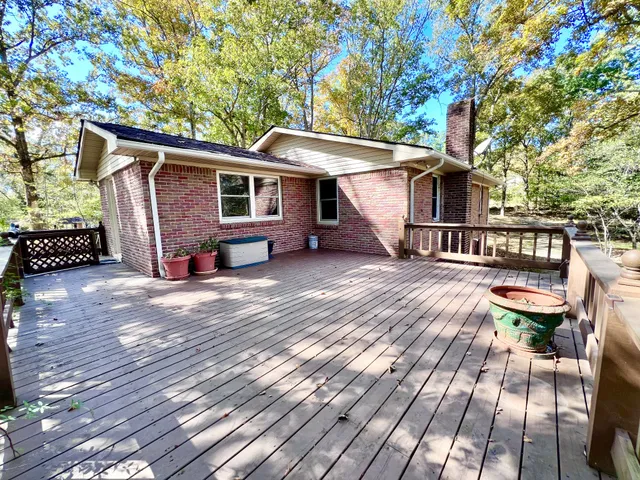 a view of a wooden deck with a patio