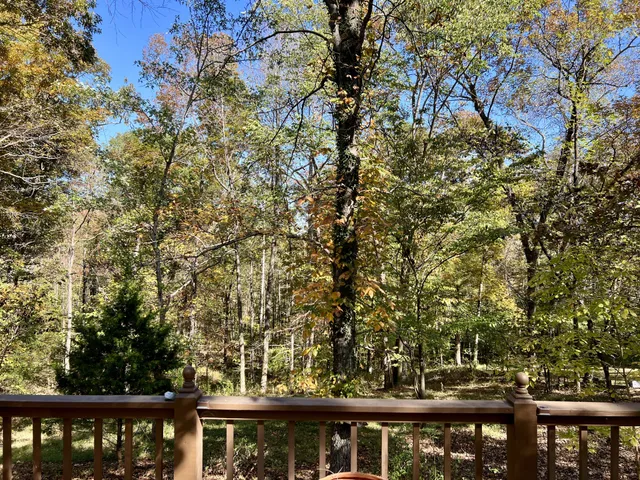 a view of a balcony with an outdoor space
