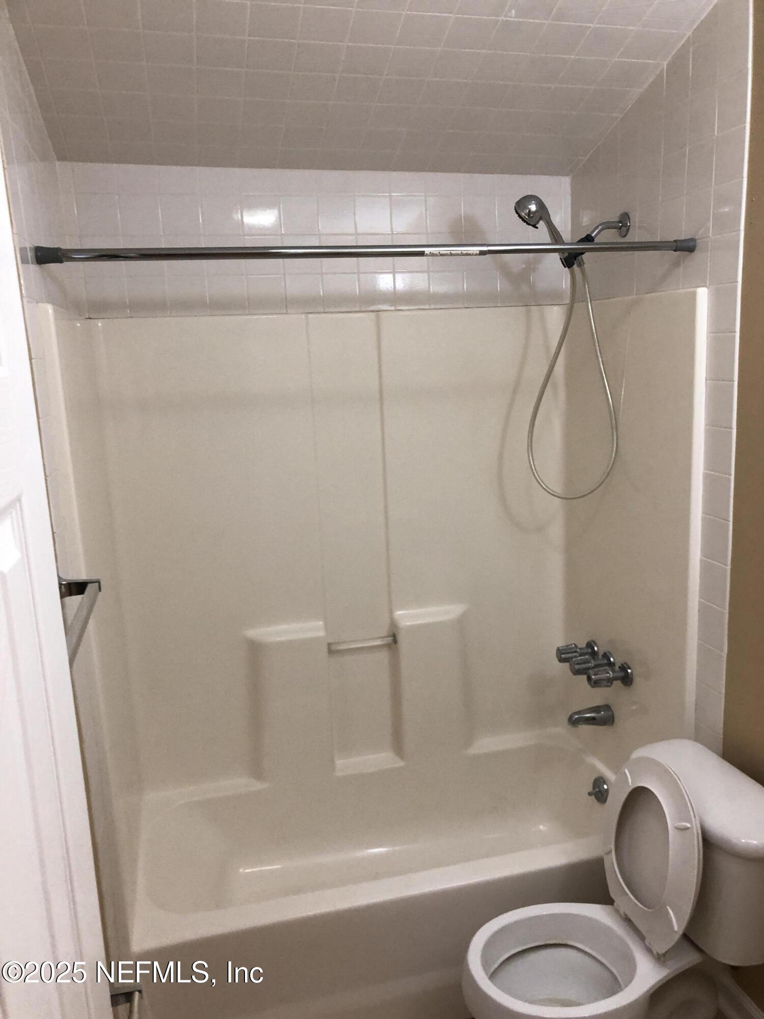 1252 Donald Street, Unit C Jacksonville, FL 32205 - Photo 4 of 7 a bathroom with a shower and a toilet