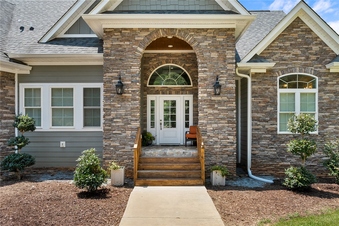 206 James Hare Road Anderson, SC 29626 - Photo 4 of 50 A welcoming stone and siding facade creates a charming entrance to this property.