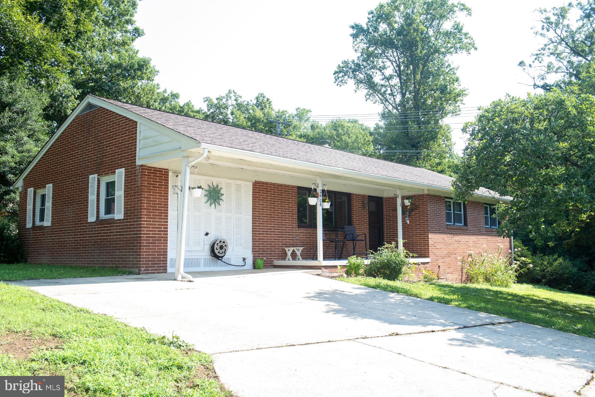 2408 Roth Road Edgewood, MD 21040 - Photo 1 of 21 Front of house with wide concrete driveway