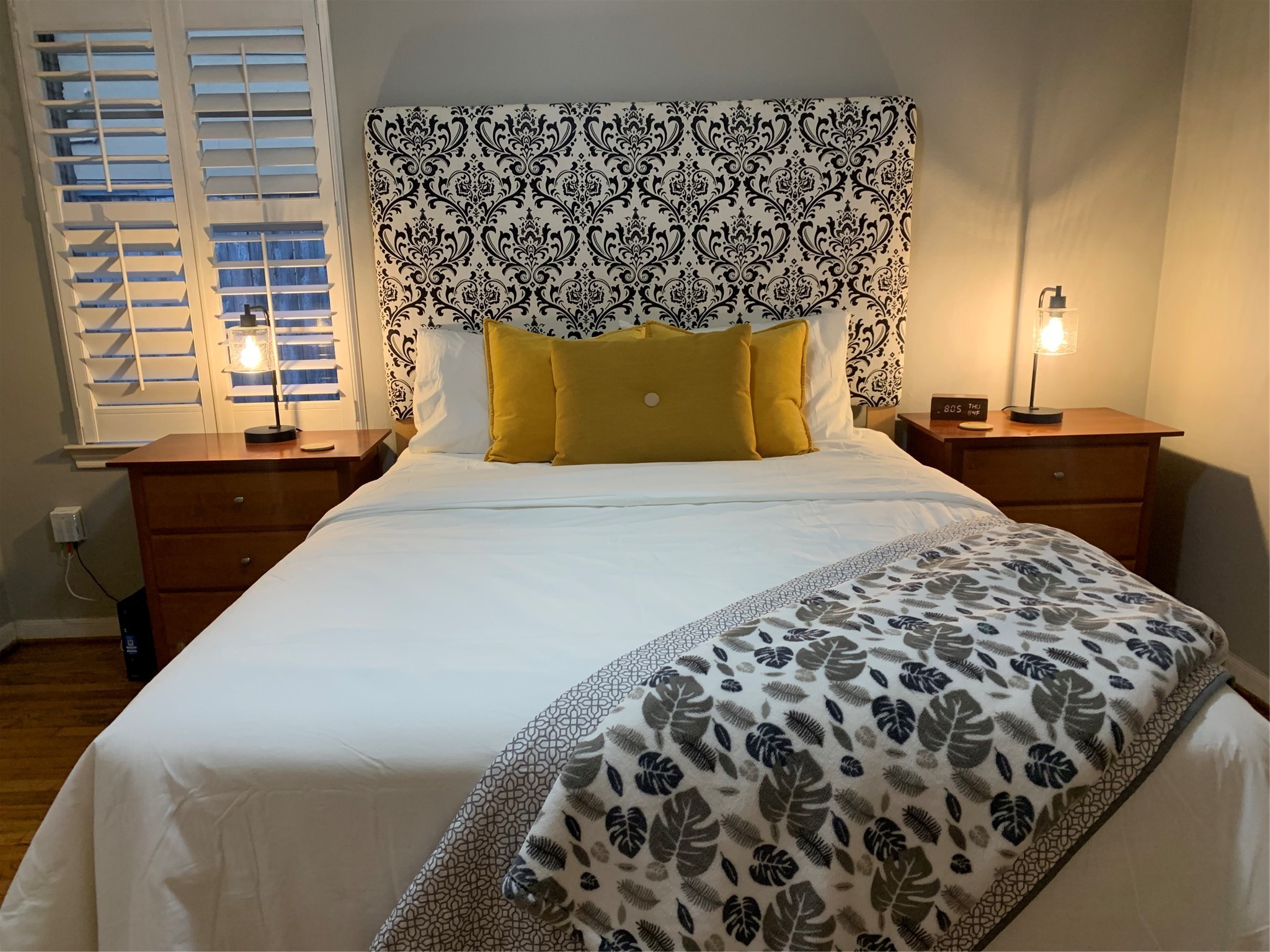 9626 Long Branch Lane Houston, TX 77055 - Photo 12 of 18 a bed sitting in a bedroom next to a window