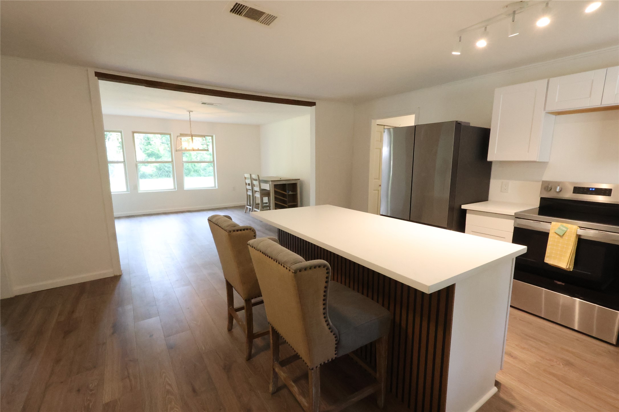 21805 Baptist Encampment Road New Caney, TX 77357 - Photo 12 of 33 Newly remodeled open concept kitchen with quartz counters.