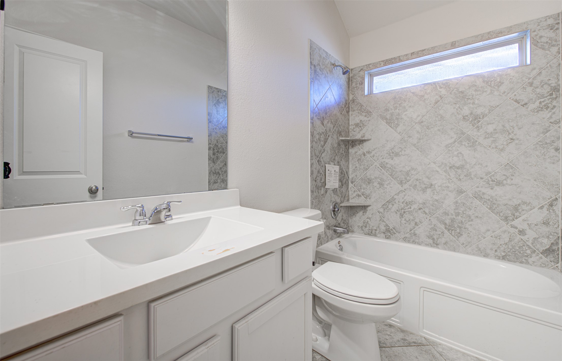 413 Pinnacle View Drive Georgetown, TX 78628 - Photo 11 of 31 Bathroom with vanity, tub / shower combination, and vaulted ceiling