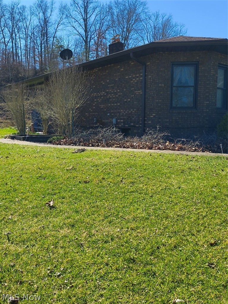 10174 Veto Road Belpre, OH 45714 - Photo 6 of 45 Left side of home