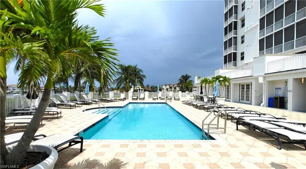 a view of a kitchen with a sink and stove