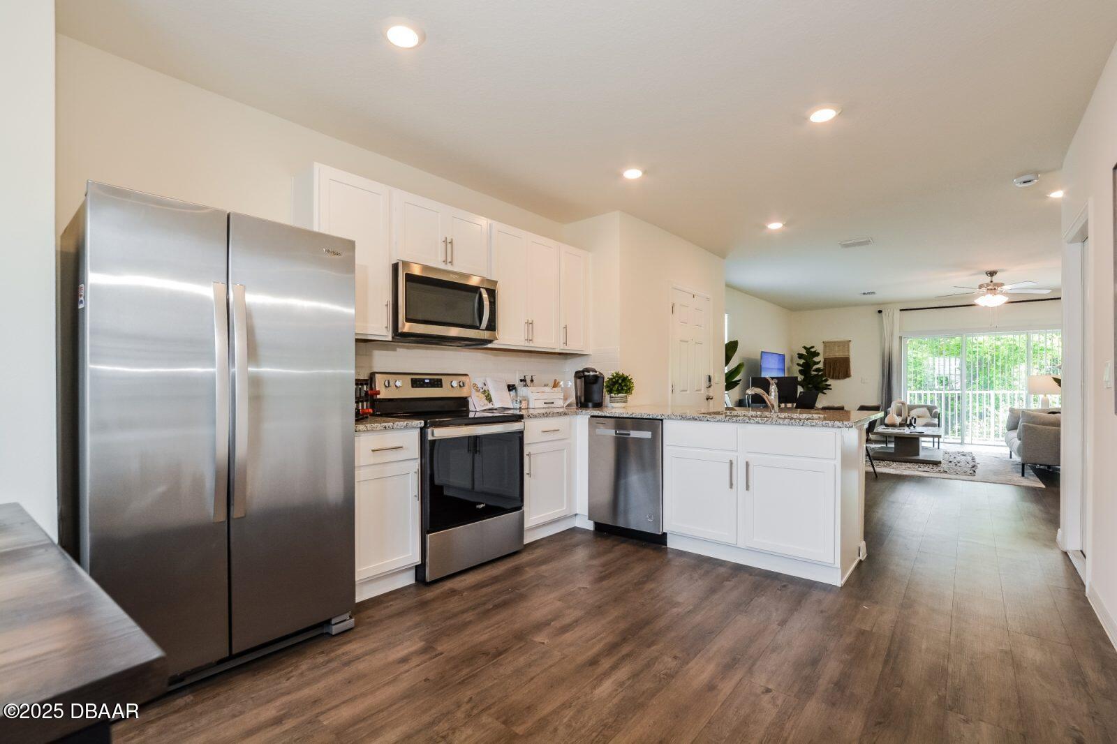 51 Center Grande Road Ormond Beach, FL 32174 - Photo 3 of 6 007-Kitchen-EOG00025 (1)