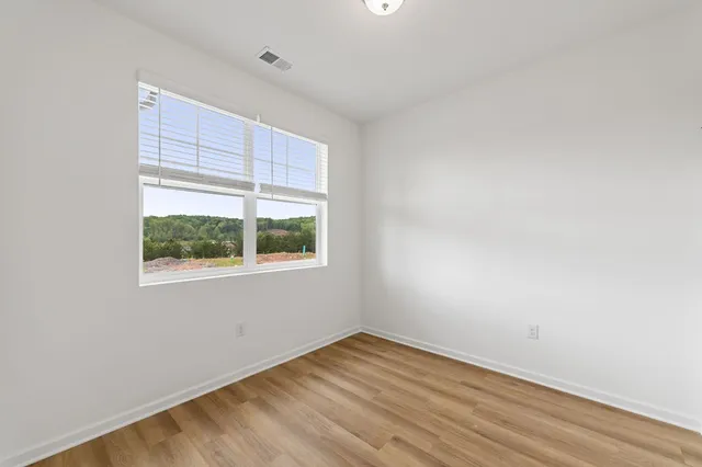 an empty room with a window