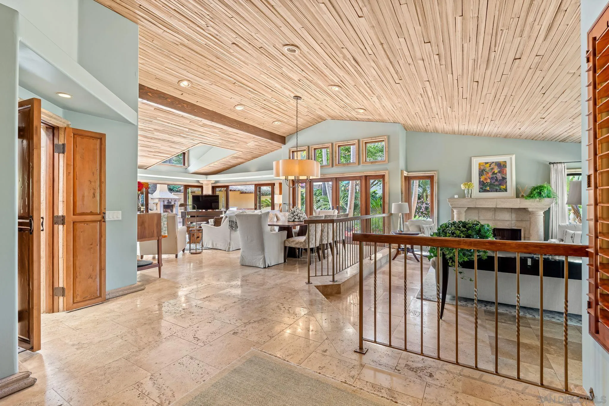 a view of a house with wooden floor and a outdoor space