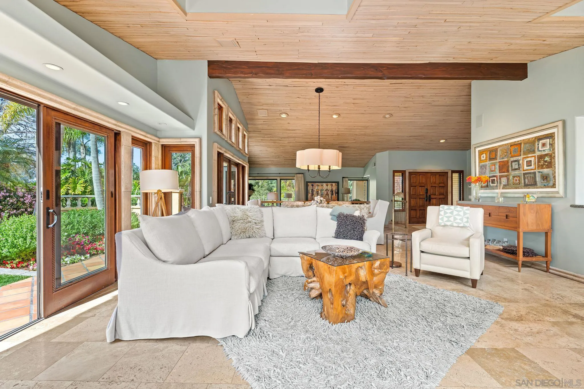 2969 Racetrack View Drive Del Mar, CA 92014 - Photo 14 of 74 a living room with patio furniture and a large window