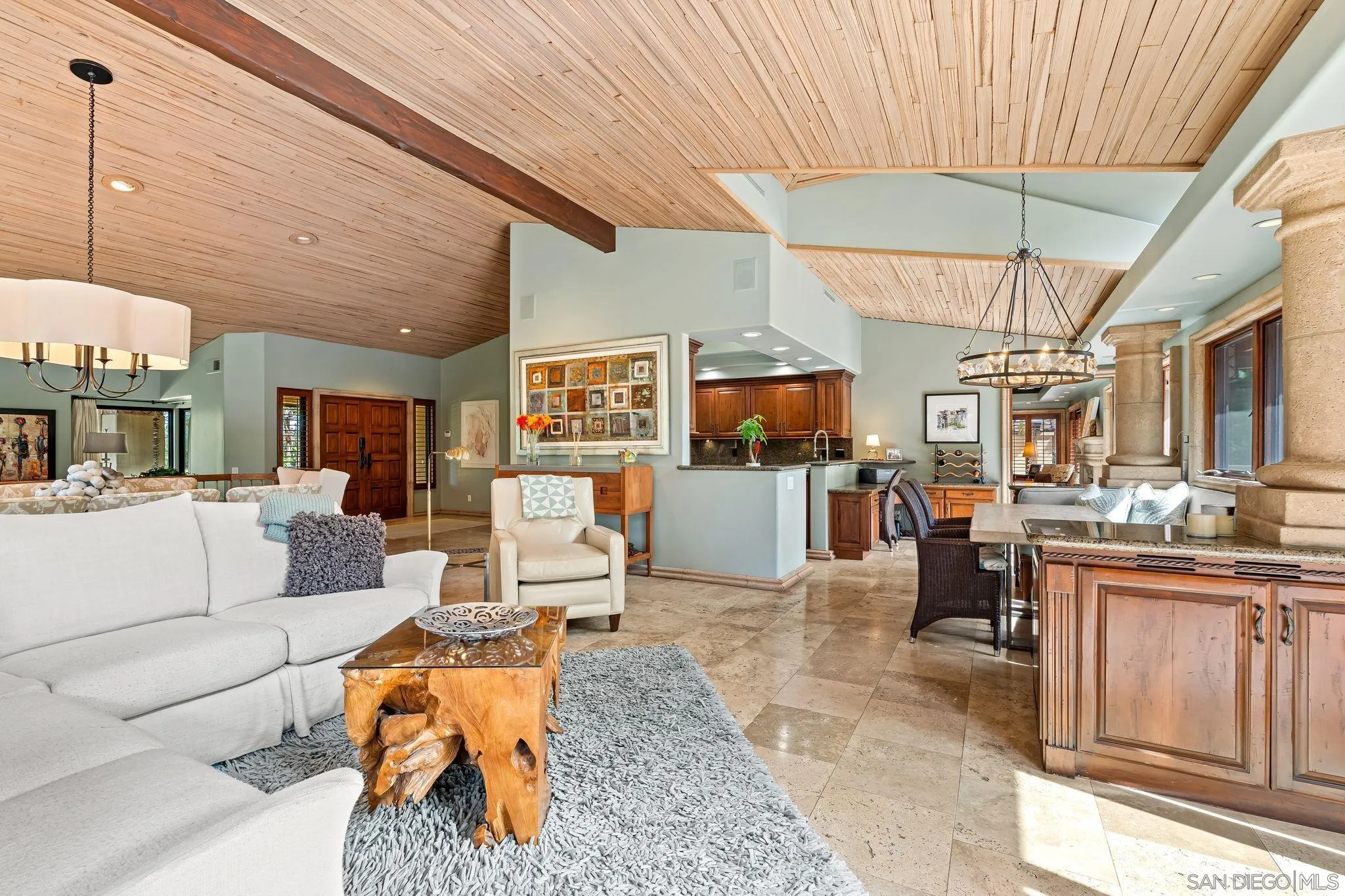 2969 Racetrack View Drive Del Mar, CA 92014 - Photo 15 of 74 a living room with lots of furniture and a chandelier
