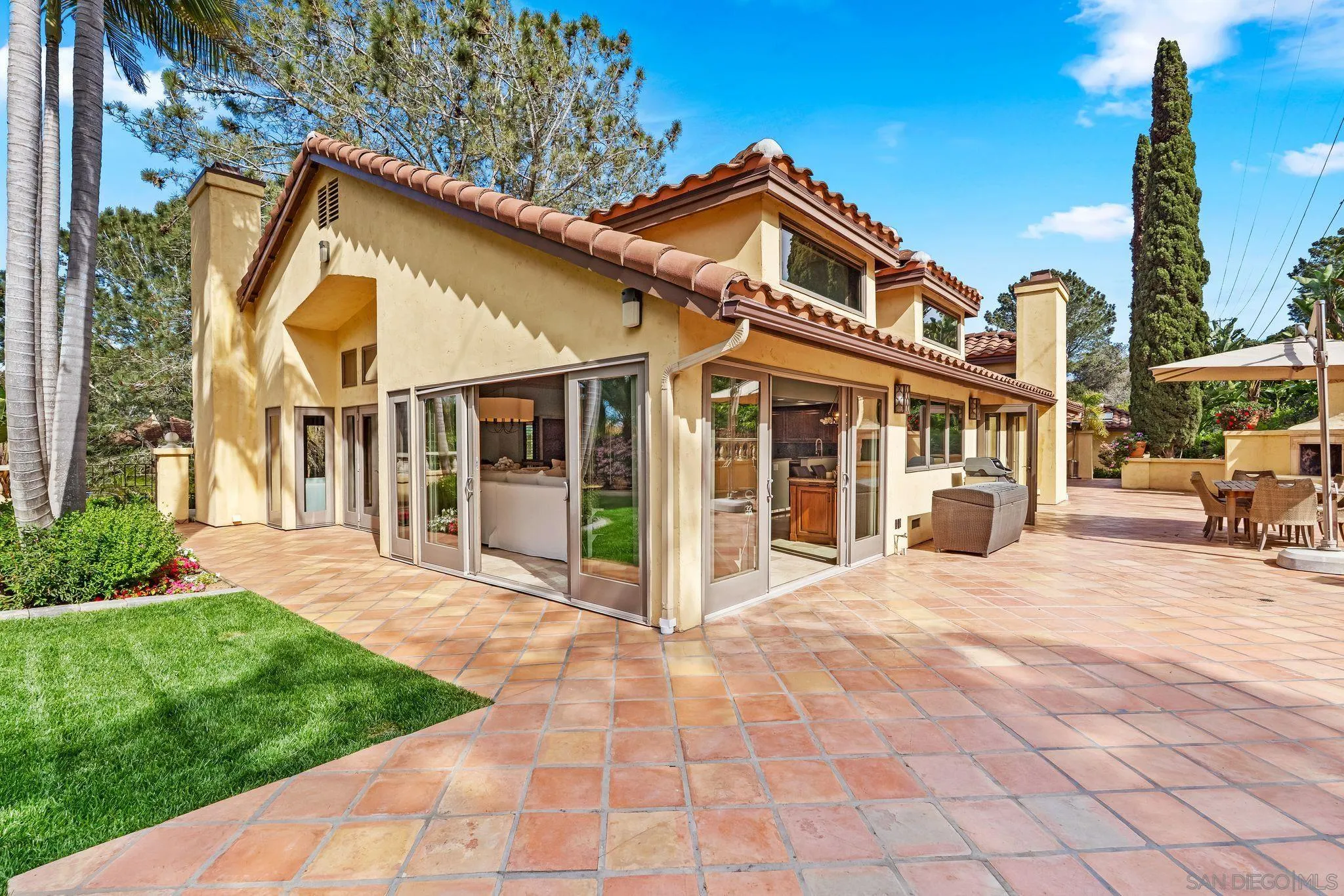 2969 Racetrack View Drive Del Mar, CA 92014 - Photo 50 of 74 a front view of a house with a yard