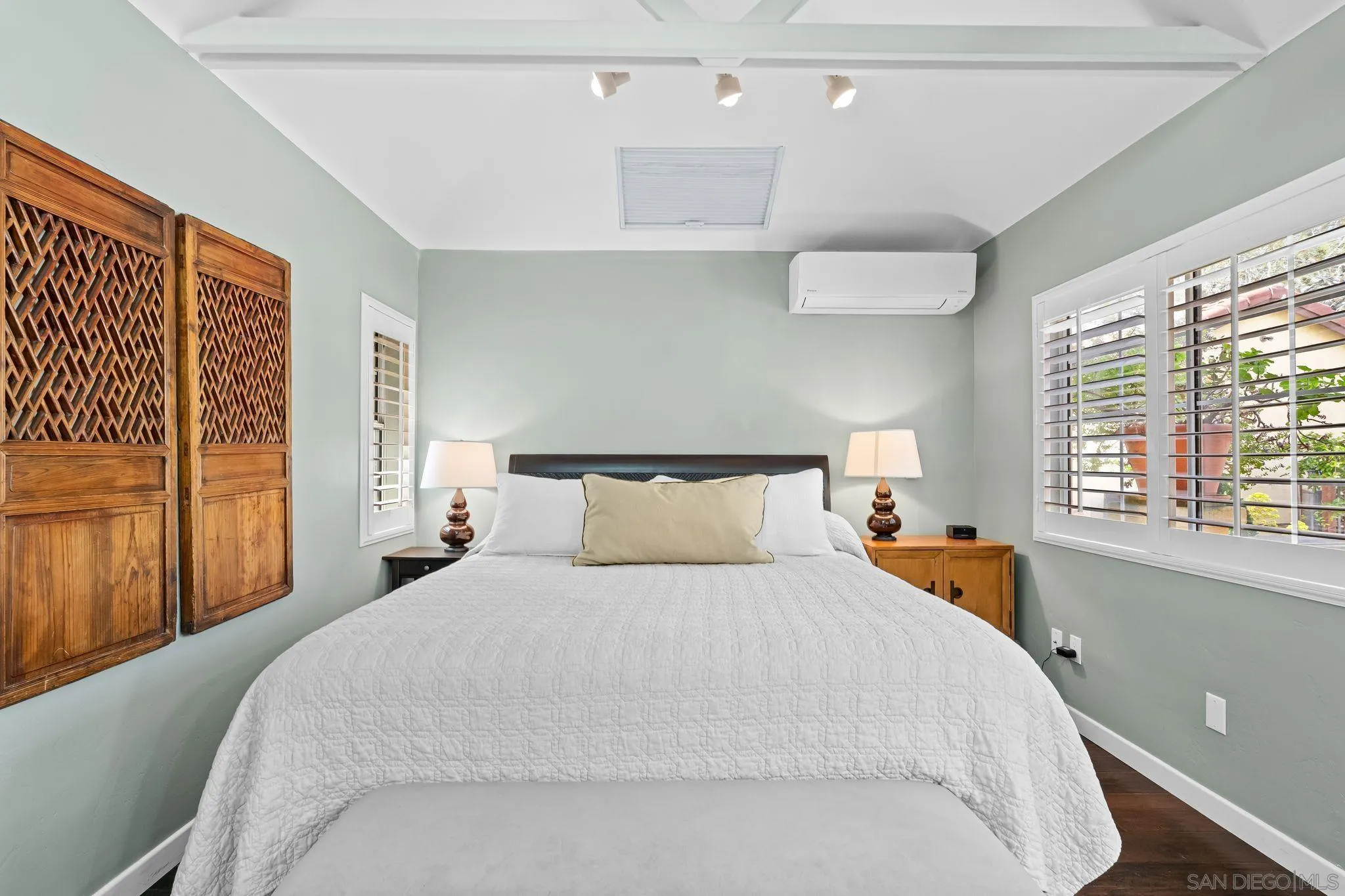 2969 Racetrack View Drive Del Mar, CA 92014 - Photo 68 of 74 a bedroom with a large bed and a large window