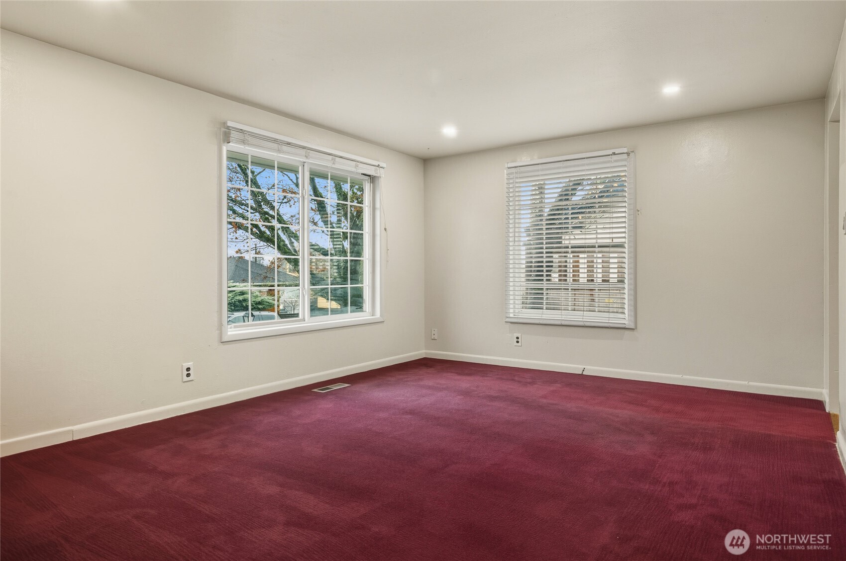 7942 15th Avenue Southwest Seattle, WA 98106 - Photo 11 of 31 an empty room with windows