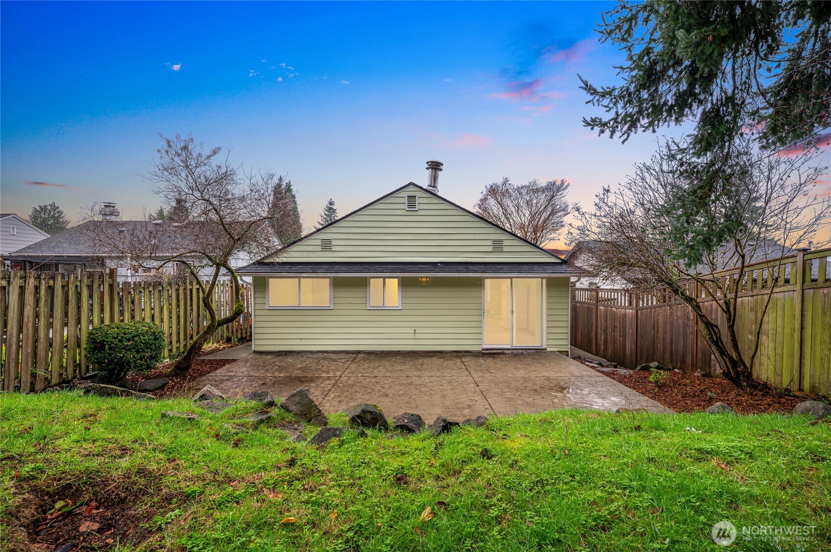 7942 15th Avenue Southwest Seattle, WA 98106 - Photo 30 of 31 a front view of a house with garden