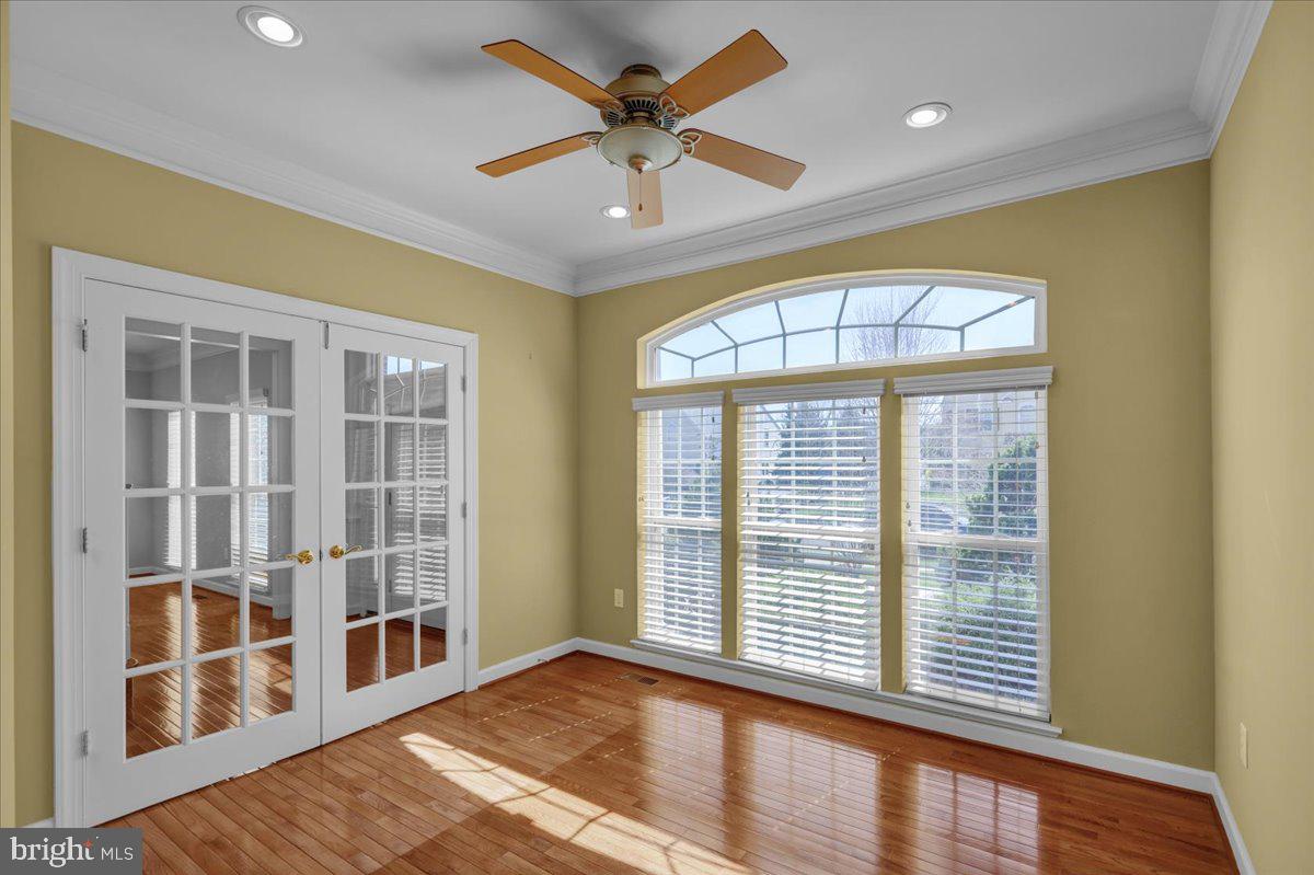 12 Hidden Brook Way Reading, PA 19608 - Photo 14 of 23 a view of an empty room with a window and wooden floor