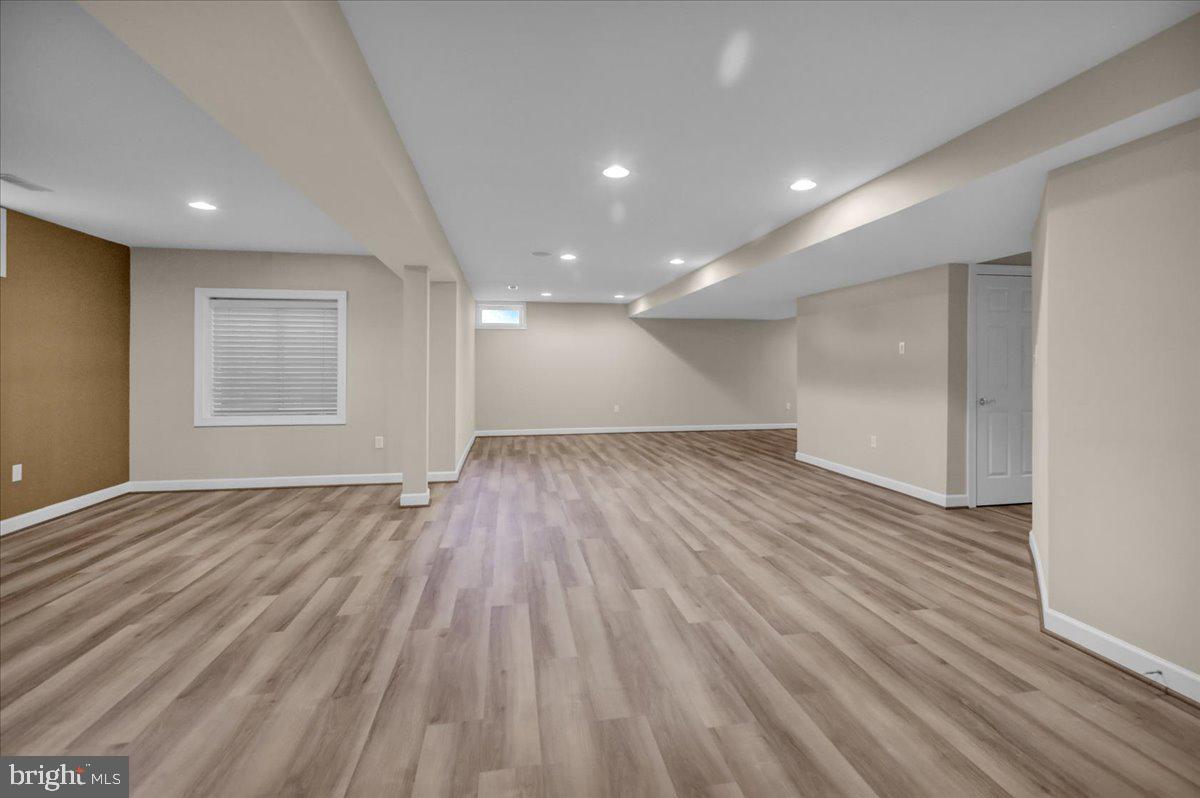12 Hidden Brook Way Reading, PA 19608 - Photo 22 of 23 a view of an empty room with wooden floor and a window