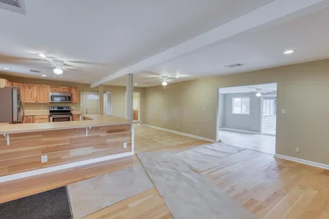 a kitchen with white cabinets