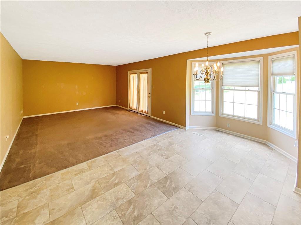 206 Ruth Way McDonald, PA 15057 - Photo 12 of 35 Dinette with bay window opens into the family room.