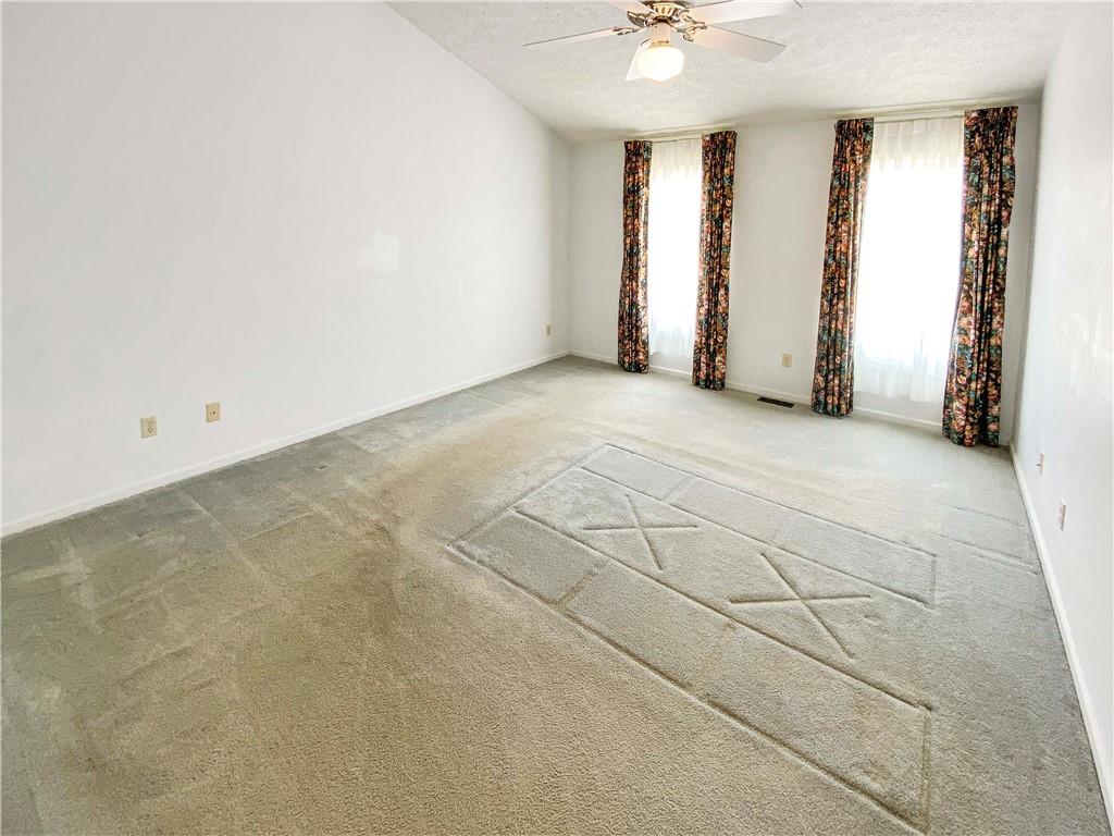 206 Ruth Way McDonald, PA 15057 - Photo 17 of 35 Spacious master bedroom with vaulted ceiling.