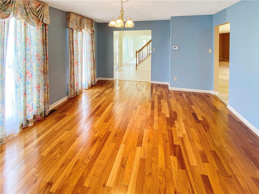206 Ruth Way McDonald, PA 15057 - Photo 5 of 35 The dining room has beautiful hardwood floors.