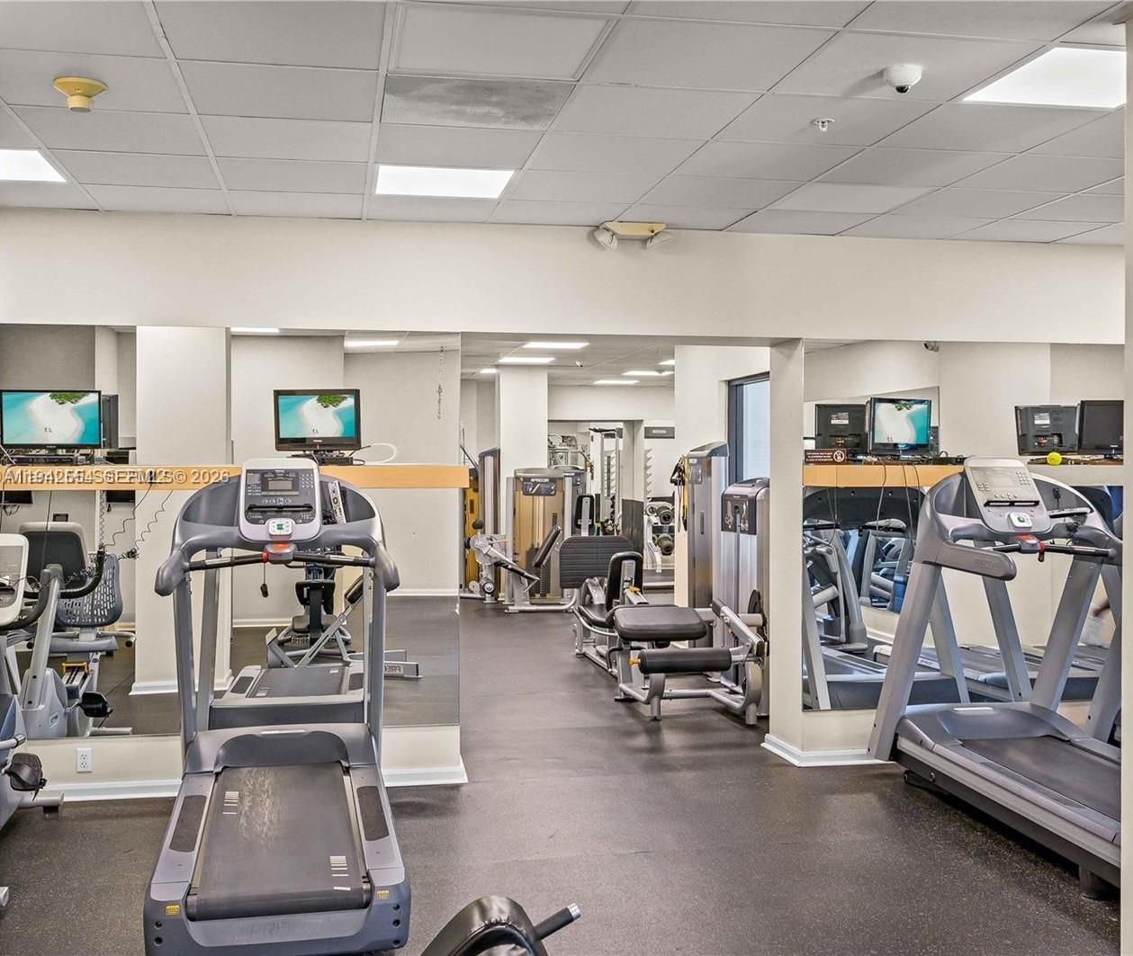 2333 Brickell Avenue, Unit 1108 Miami, FL 33129 - Photo 9 of 17 a view of a room with gym equipment