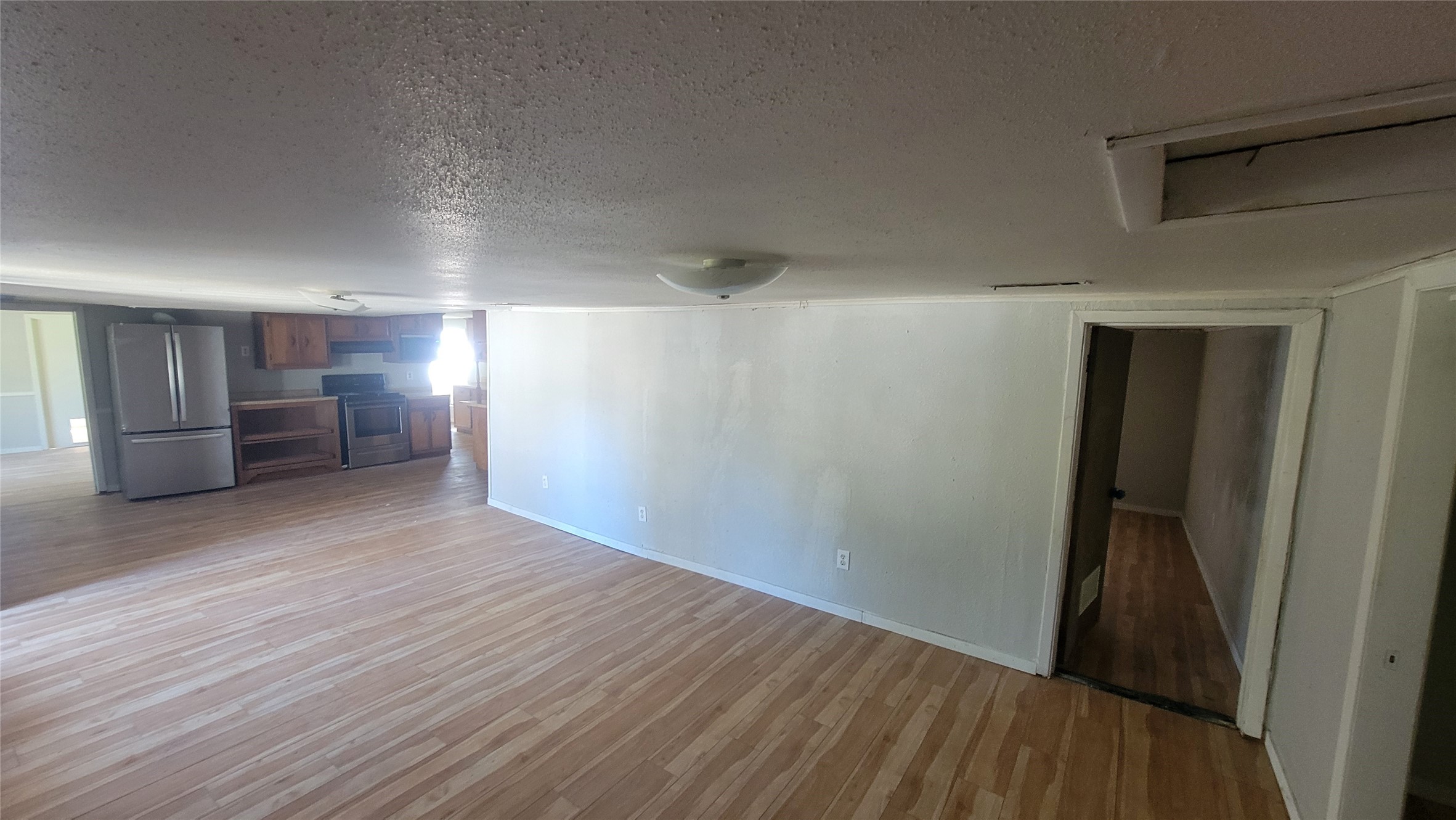 2960 Call Street Vidor, TX 77662 - Photo 20 of 46 a view of empty room with wooden floor