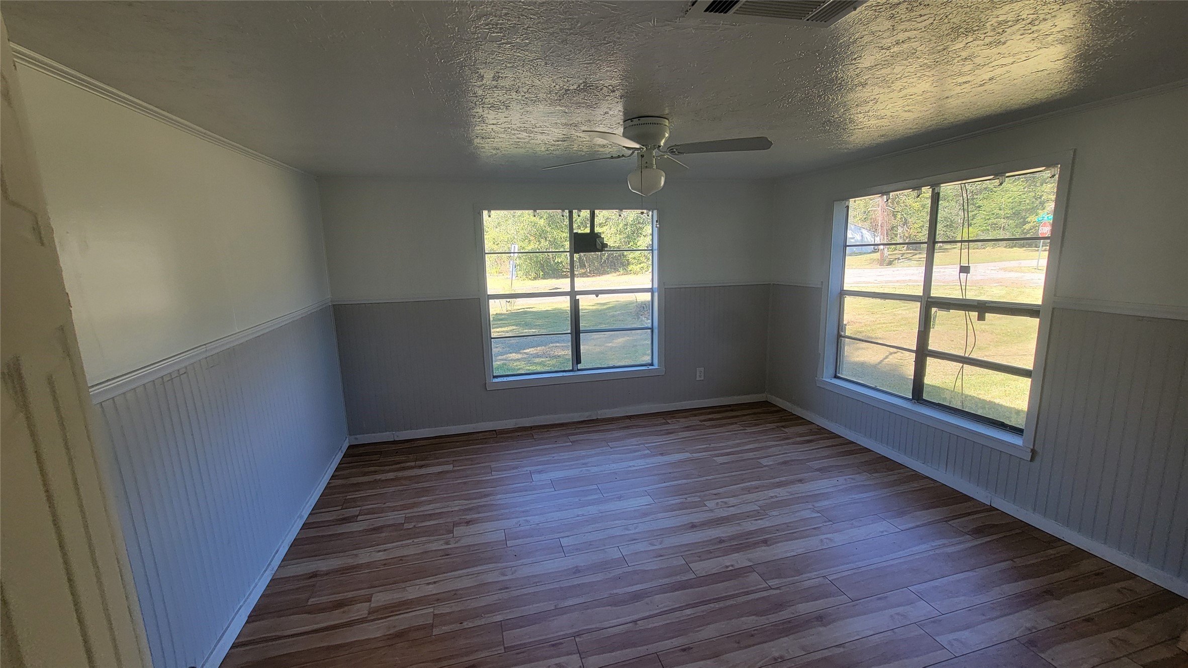 2960 Call Street Vidor, TX 77662 - Photo 29 of 46 a view of an empty room with wooden floor and a window