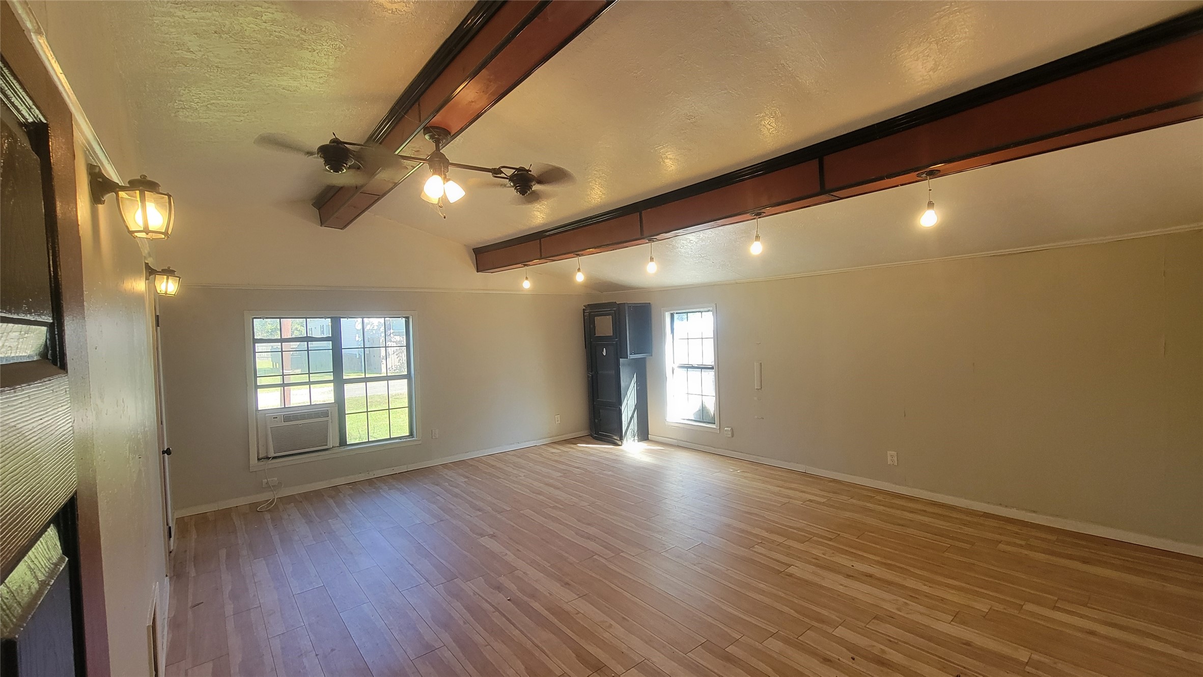 2960 Call Street Vidor, TX 77662 - Photo 32 of 46 a view of empty room with wooden floor and fan