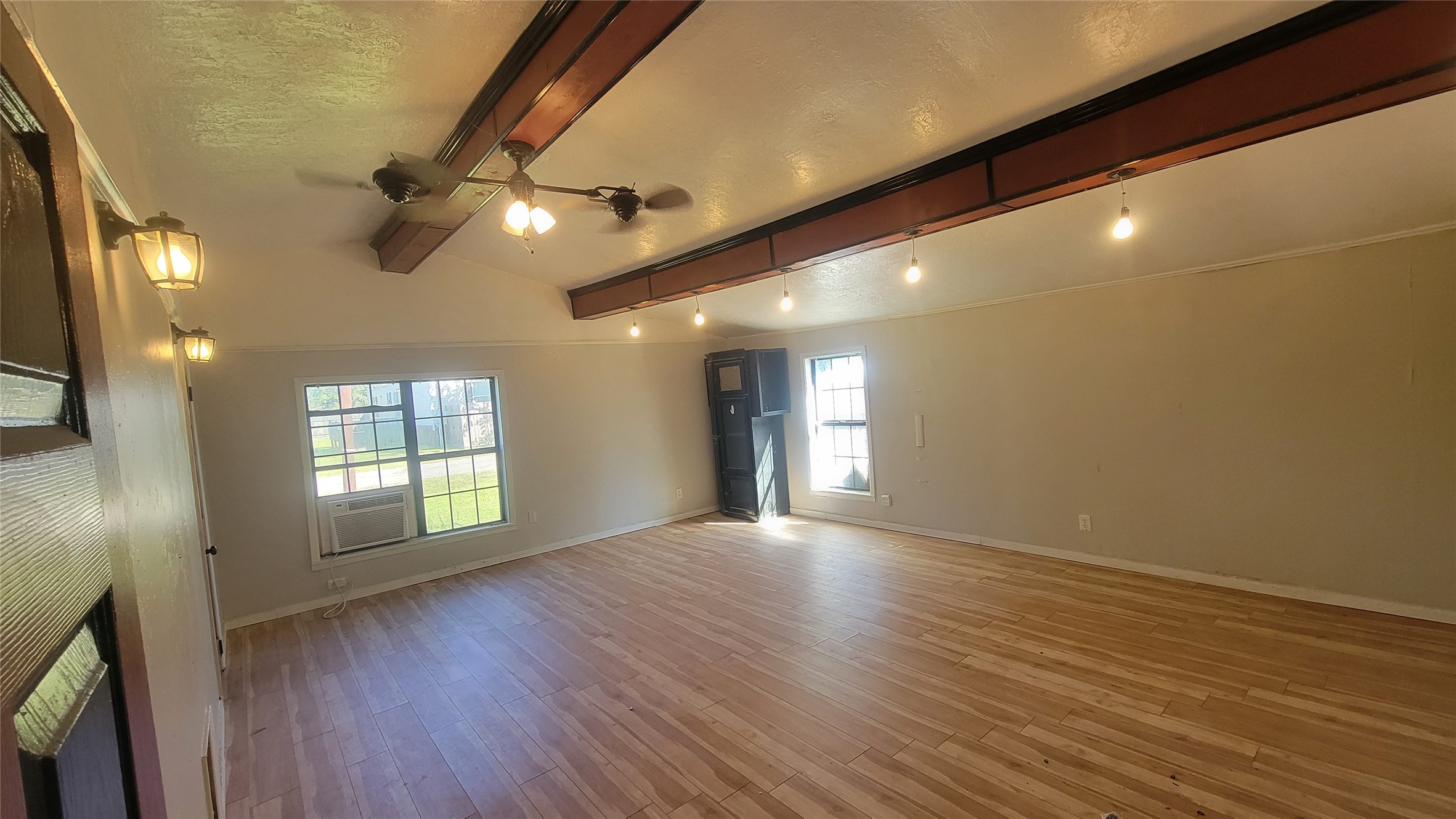 2960 Call Street Vidor, TX 77662 - Photo 33 of 46 a view of an empty room with wooden floor and a window