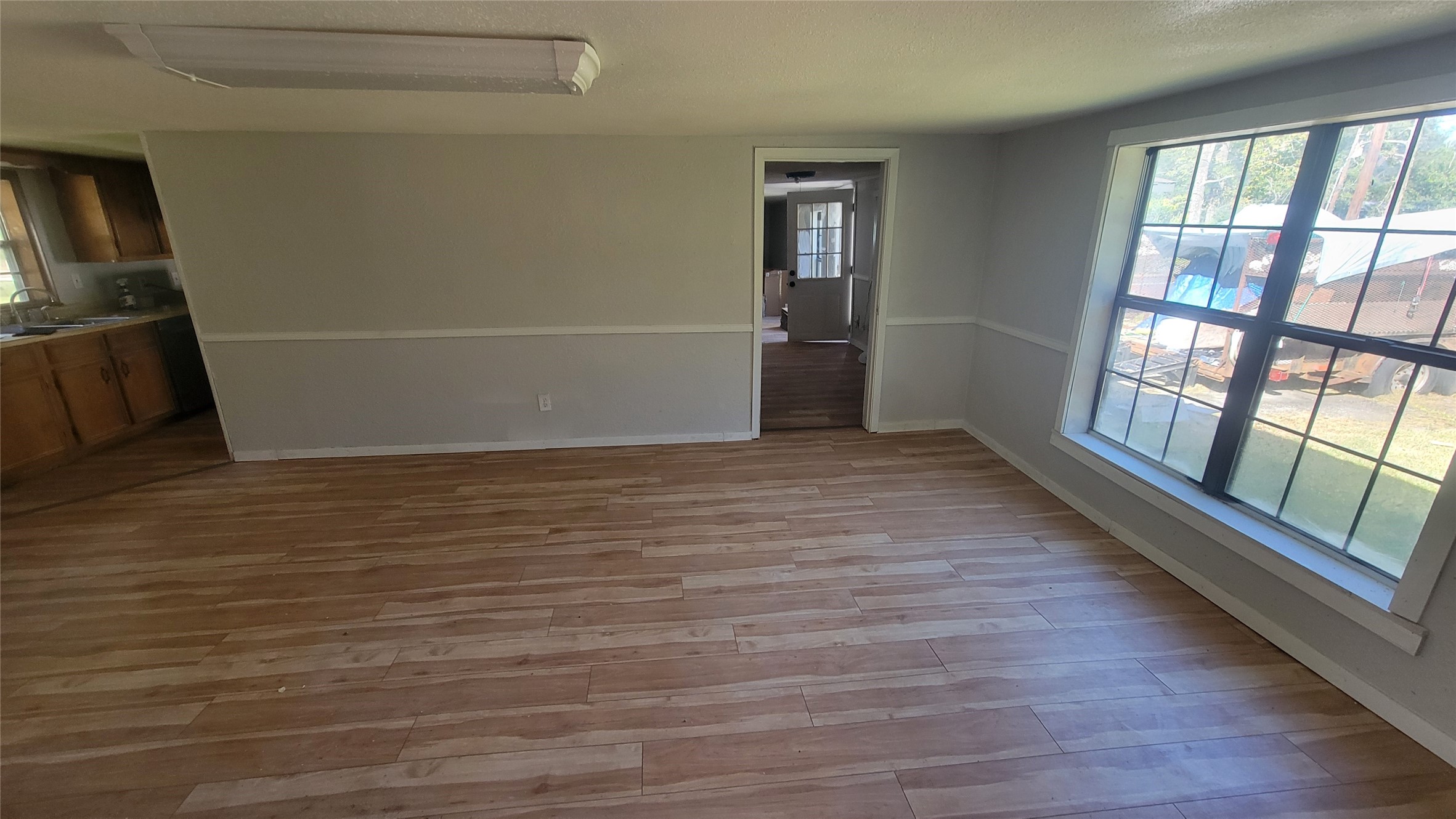 2960 Call Street Vidor, TX 77662 - Photo 10 of 46 wooden floor in an empty room with a window