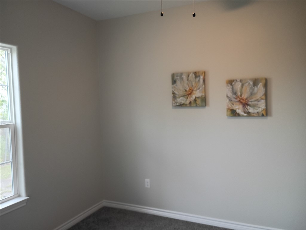 1652 16th Street Corpus Christi, TX 78404 - Photo 15 of 19 an empty room with a window