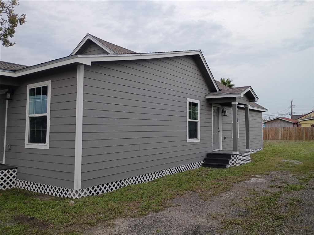 1652 16th Street Corpus Christi, TX 78404 - Photo 17 of 19 a front view of a house with garden