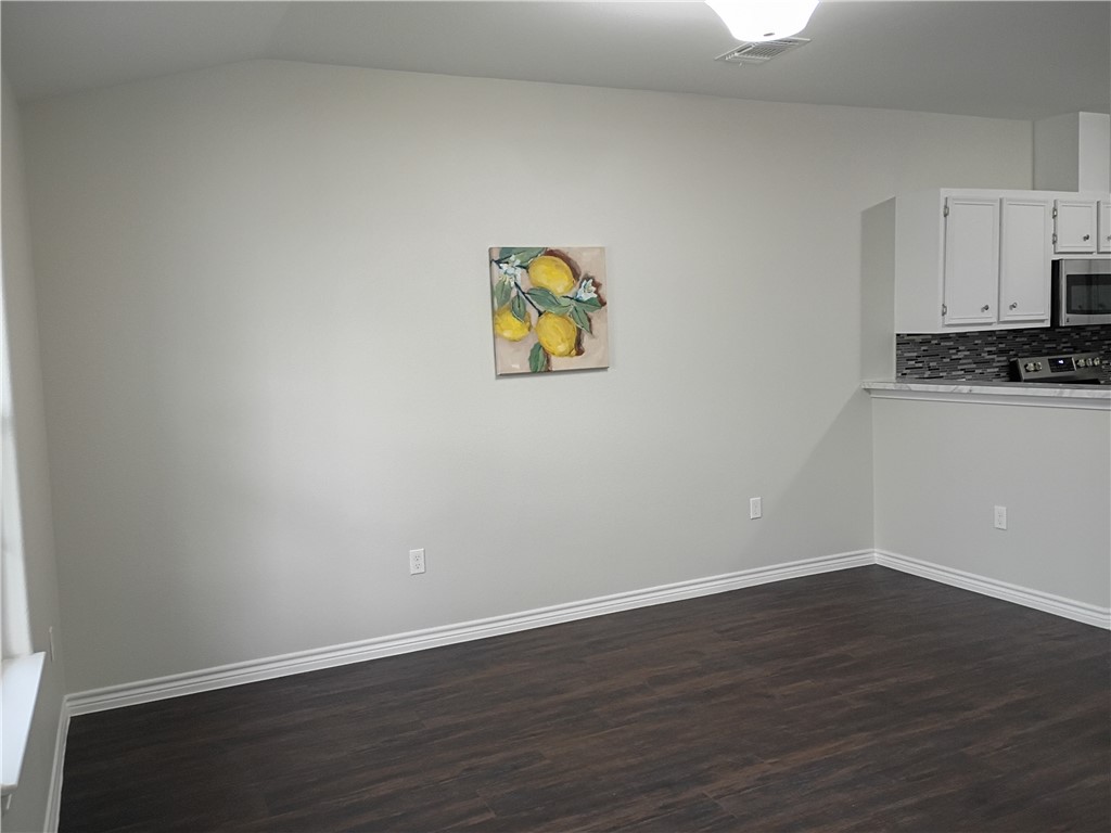 1652 16th Street Corpus Christi, TX 78404 - Photo 5 of 19 a view of a kitchen with wooden floor and a sink