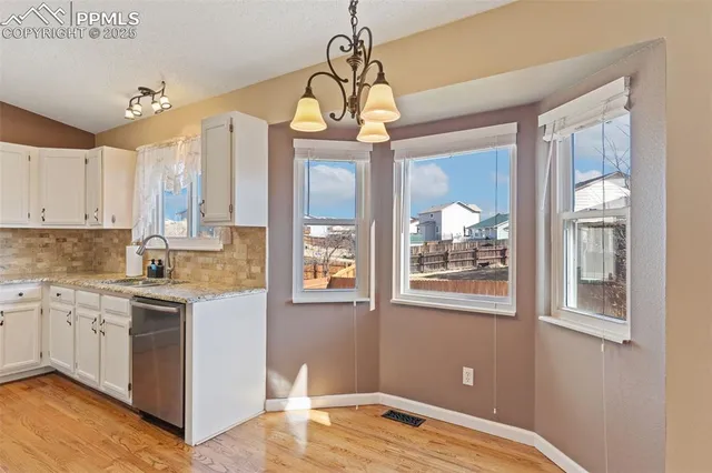 a view of a kitchen with a window