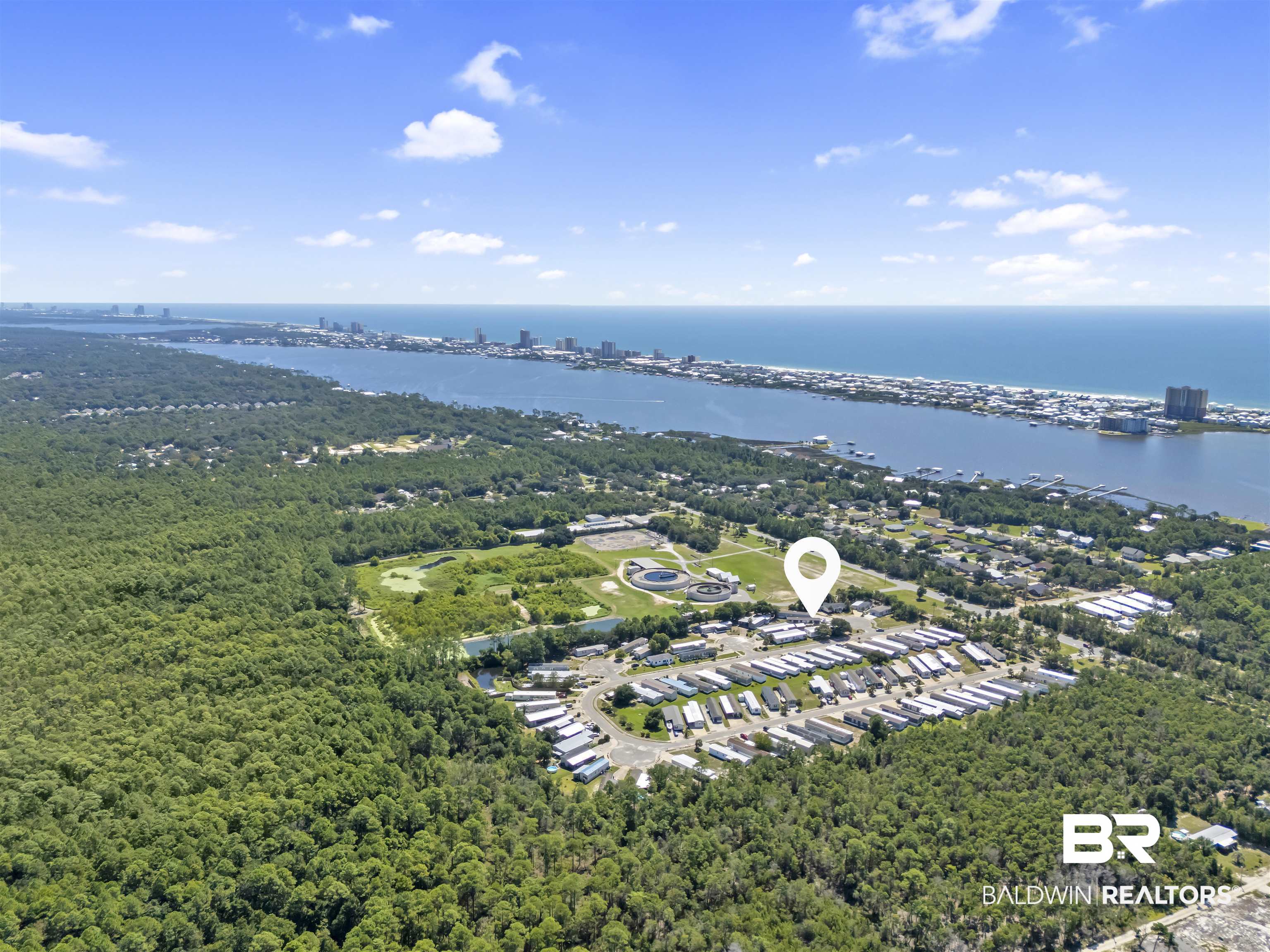 16707 Fort Morgan Road Gulf Shores, AL 36542 - Photo 21 of 22 Aerial view of a nearby body of water
