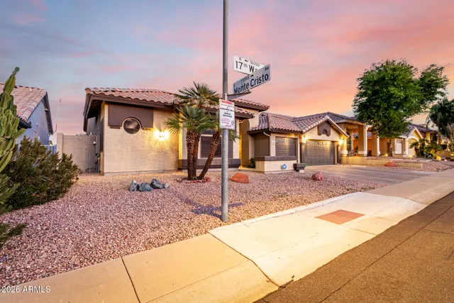 a front view of a house with street