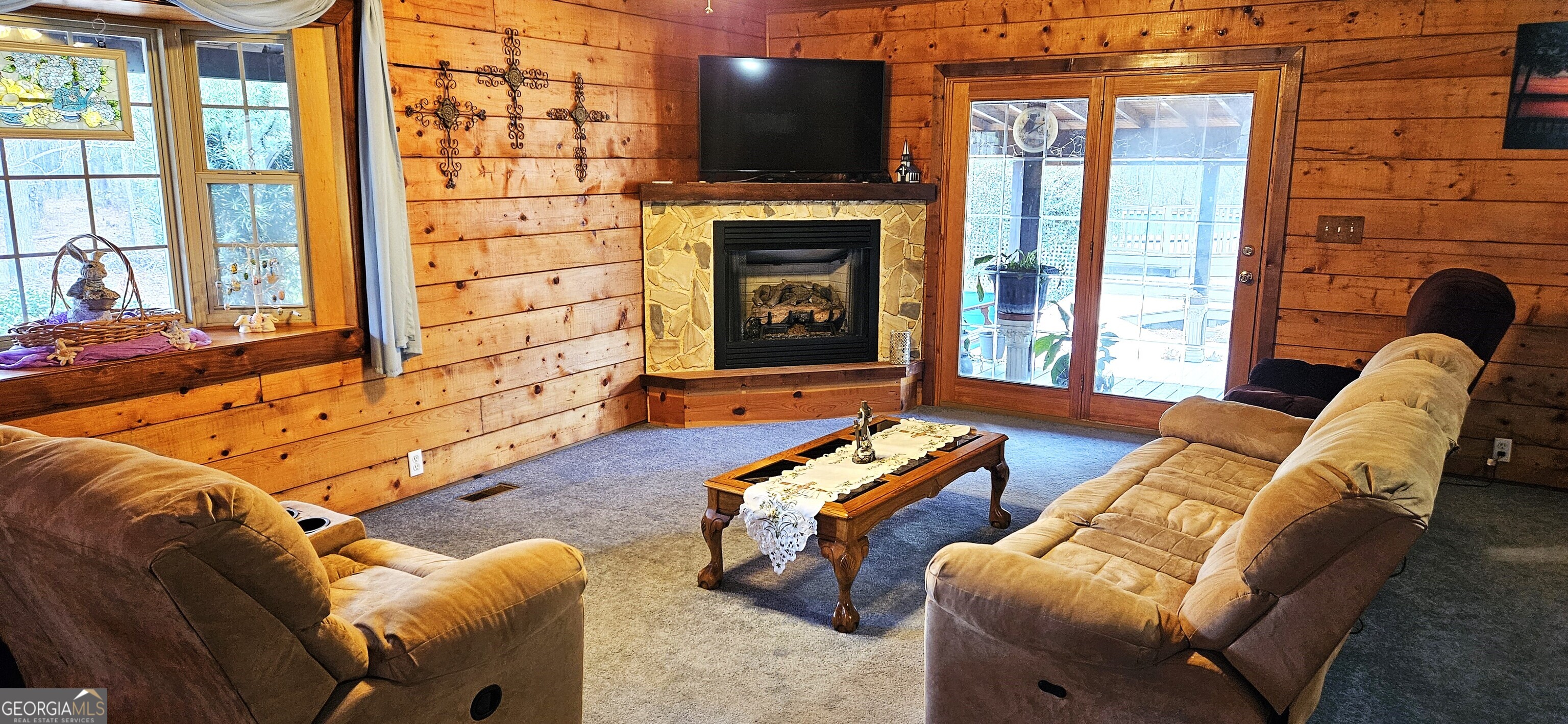 1851-i G I G Lanier Road Pembroke, GA 31321 - Photo 21 of 80 a living room with furniture fireplace and flat screen tv
