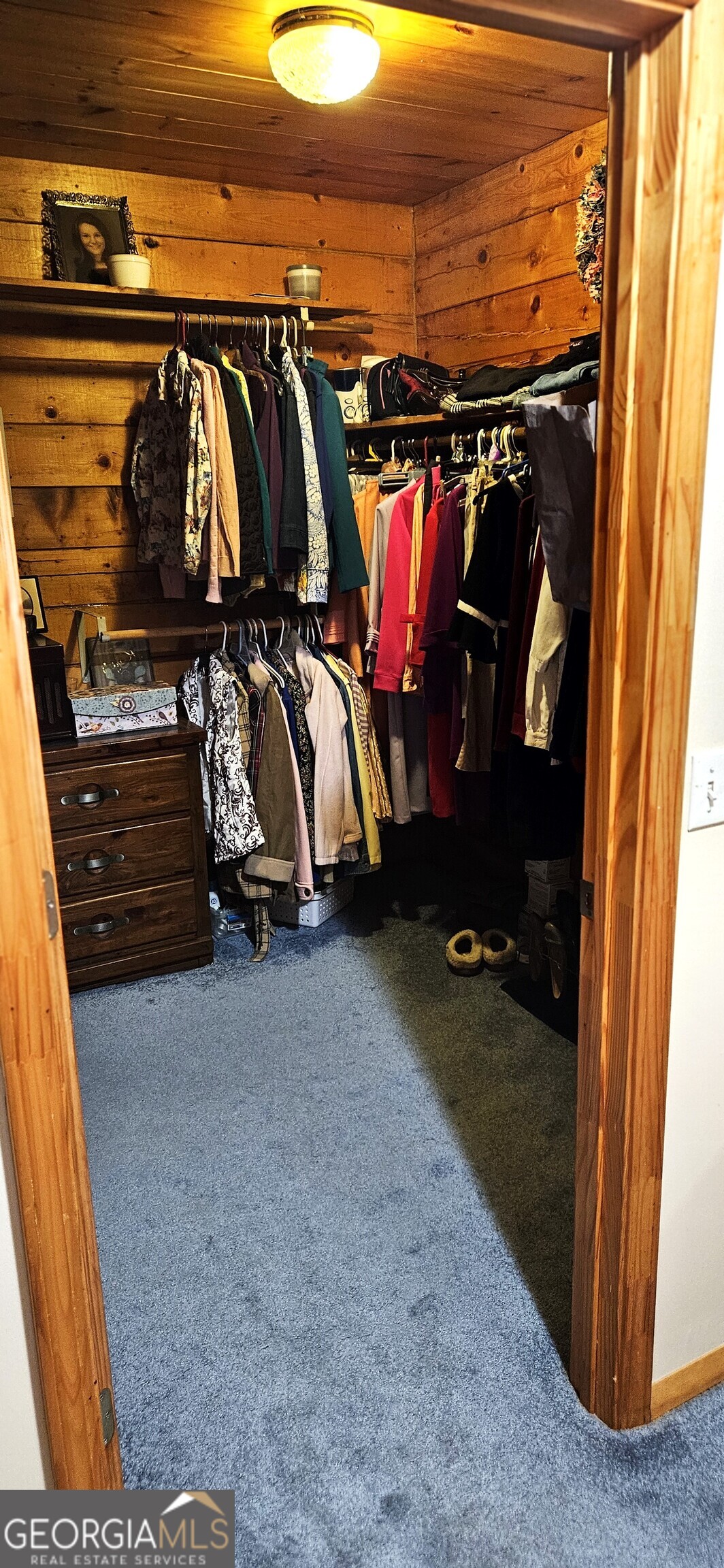 1851-i G I G Lanier Road Pembroke, GA 31321 - Photo 43 of 80 a view of walk in closet with clothes and shoes