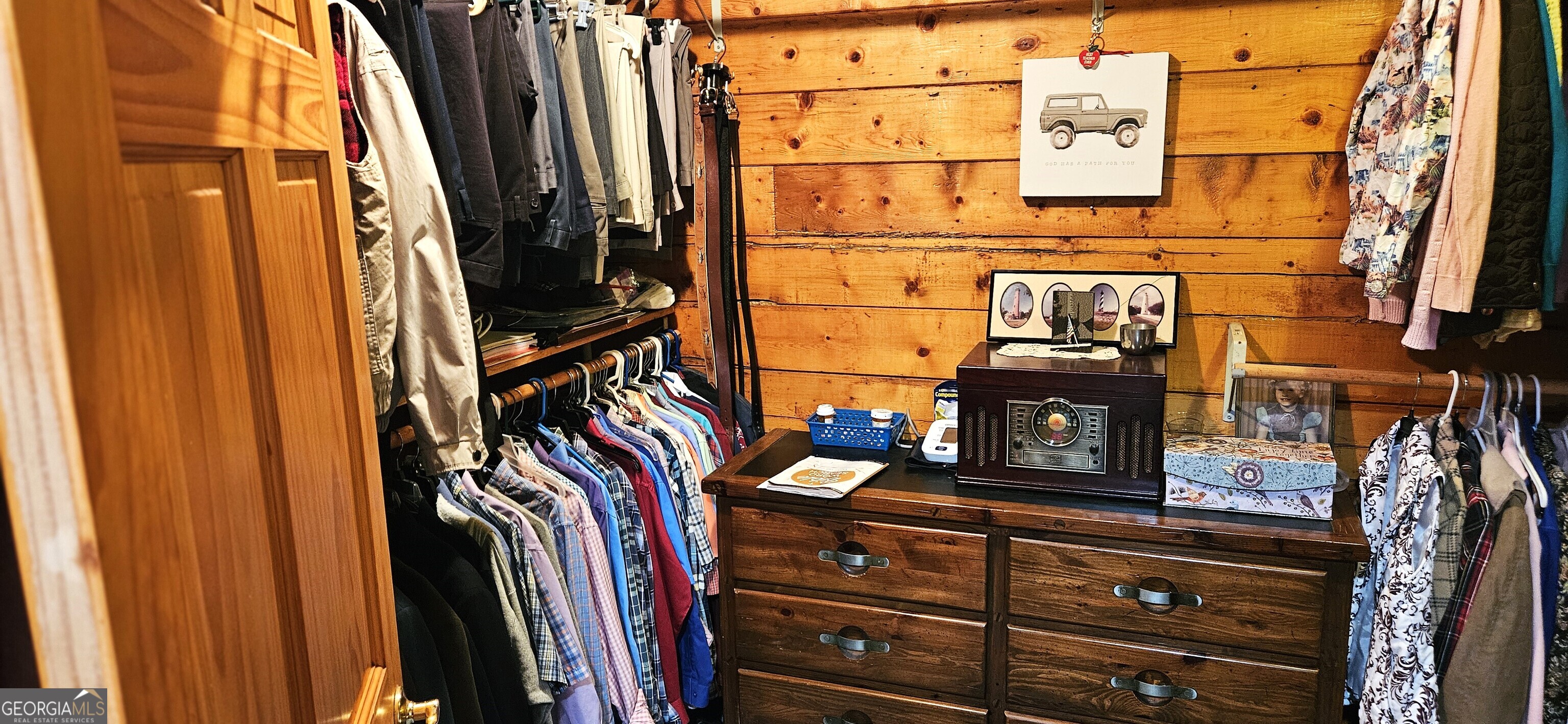 1851-i G I G Lanier Road Pembroke, GA 31321 - Photo 44 of 80 a view of walk in closet with clothes