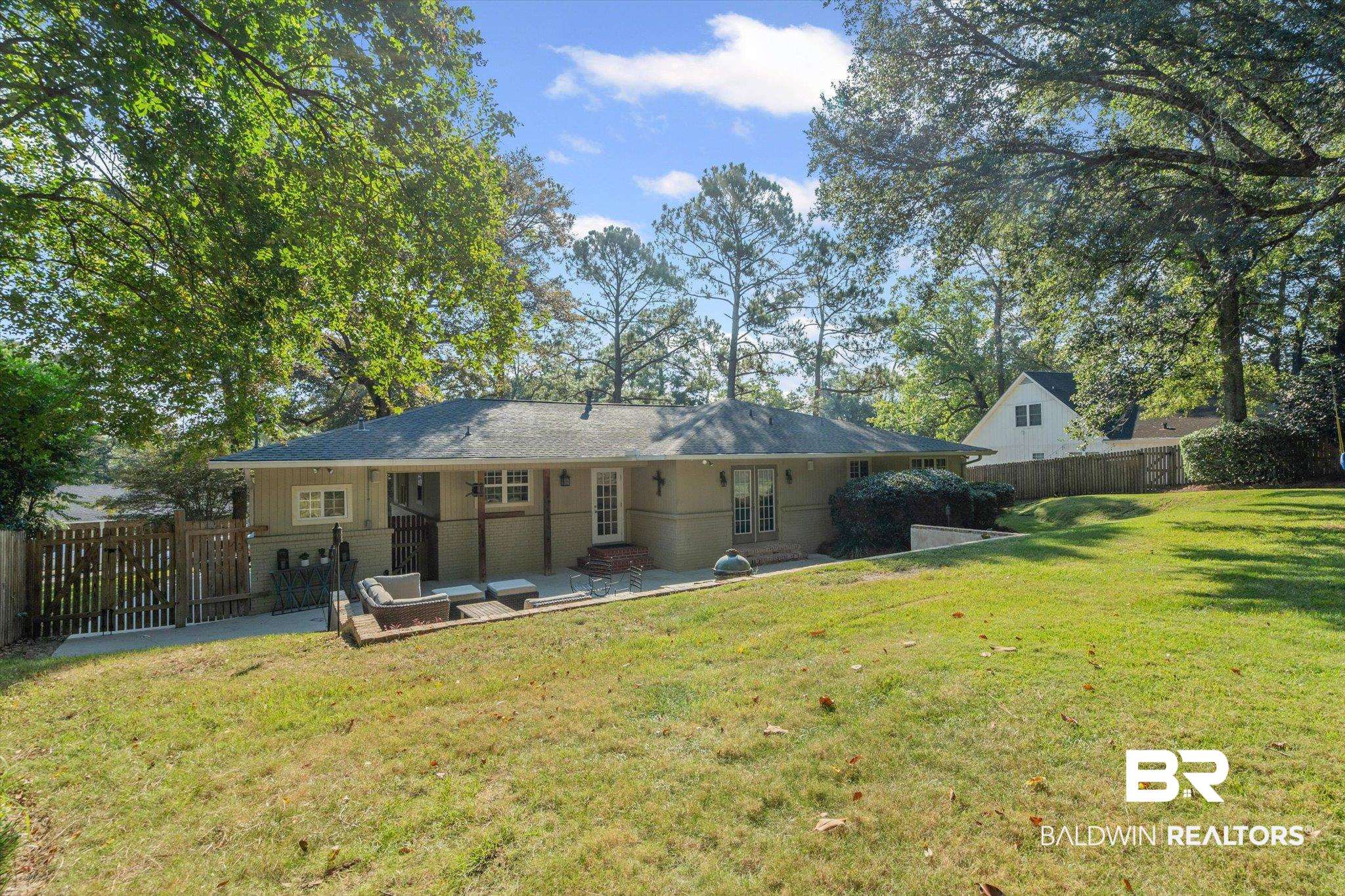 313 Brawood Drive Mobile, AL 36608 - Photo 27 of 32 Rear view of property with a patio area